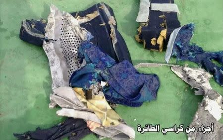 Recovered debris of the EgyptAir jet that crashed in the Mediterranean Sea is seen with the Arabic caption "part of plane chair" in this still image taken from video on May 21, 2016. Egyptian Military/Handout via Reuters TV