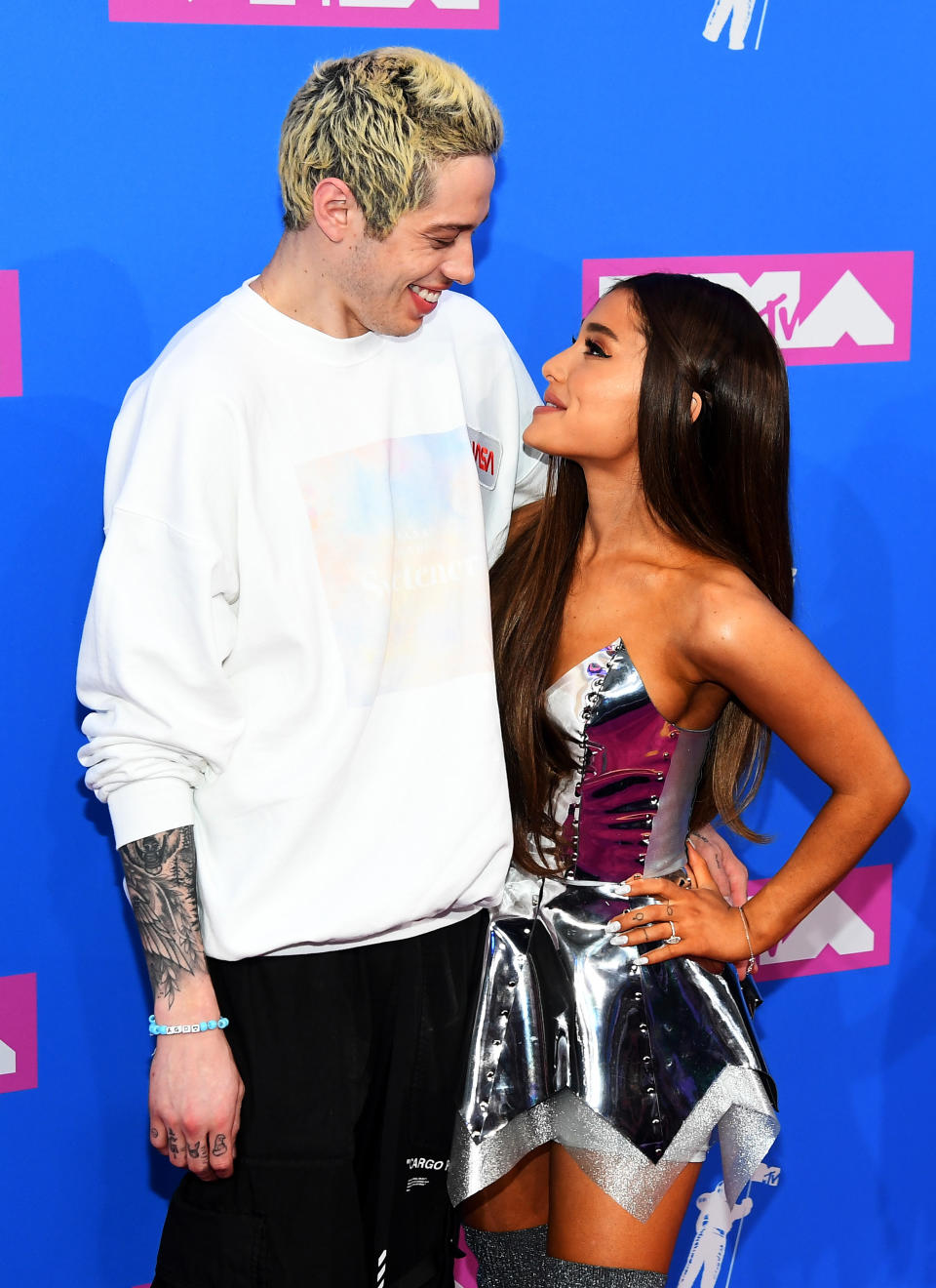 Pete and Ariana looking at each other and smiling