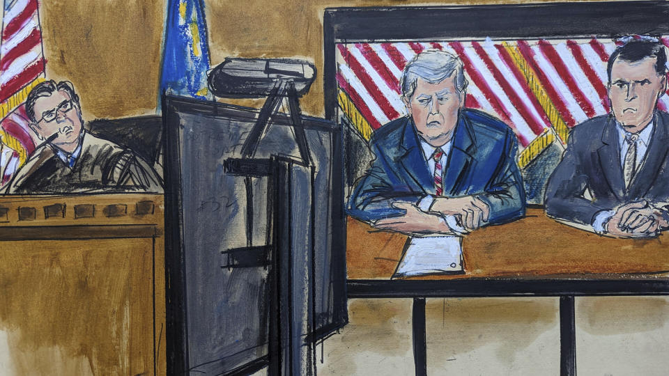 In this artist depeiction, former president Donald Trump, left on screen, and his attorney Todd Blanche, right on screen, appear via video in Manhattan criminal court, in New York, Tuesday, May 23, 2023. Trump made a video appearance Tuesday in his New York criminal case, with Judge Juan Manuel Merchan, left, setting a trial date for late March of next year. (Elizabeth Williams via AP)