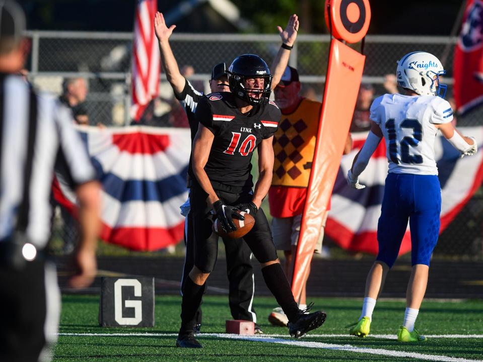 Brandon Valley's Dylan Langerock yells in victory after scoring a touchdown in a football game on Saturday, August 27, 2022, in Brandon.