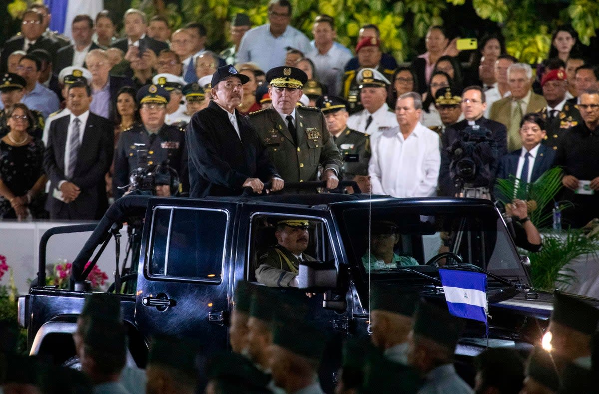 Ortega (left) and commander in chief of the Nicaraguan Army Julio Aviles during a ceremony in 2020  (AFP/Getty)