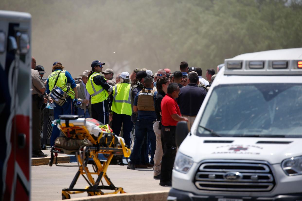 Emergency personnel gather near Robb Elementary School following a shooting, Tuesday, May 24, 2022, in Uvalde, Texas. 