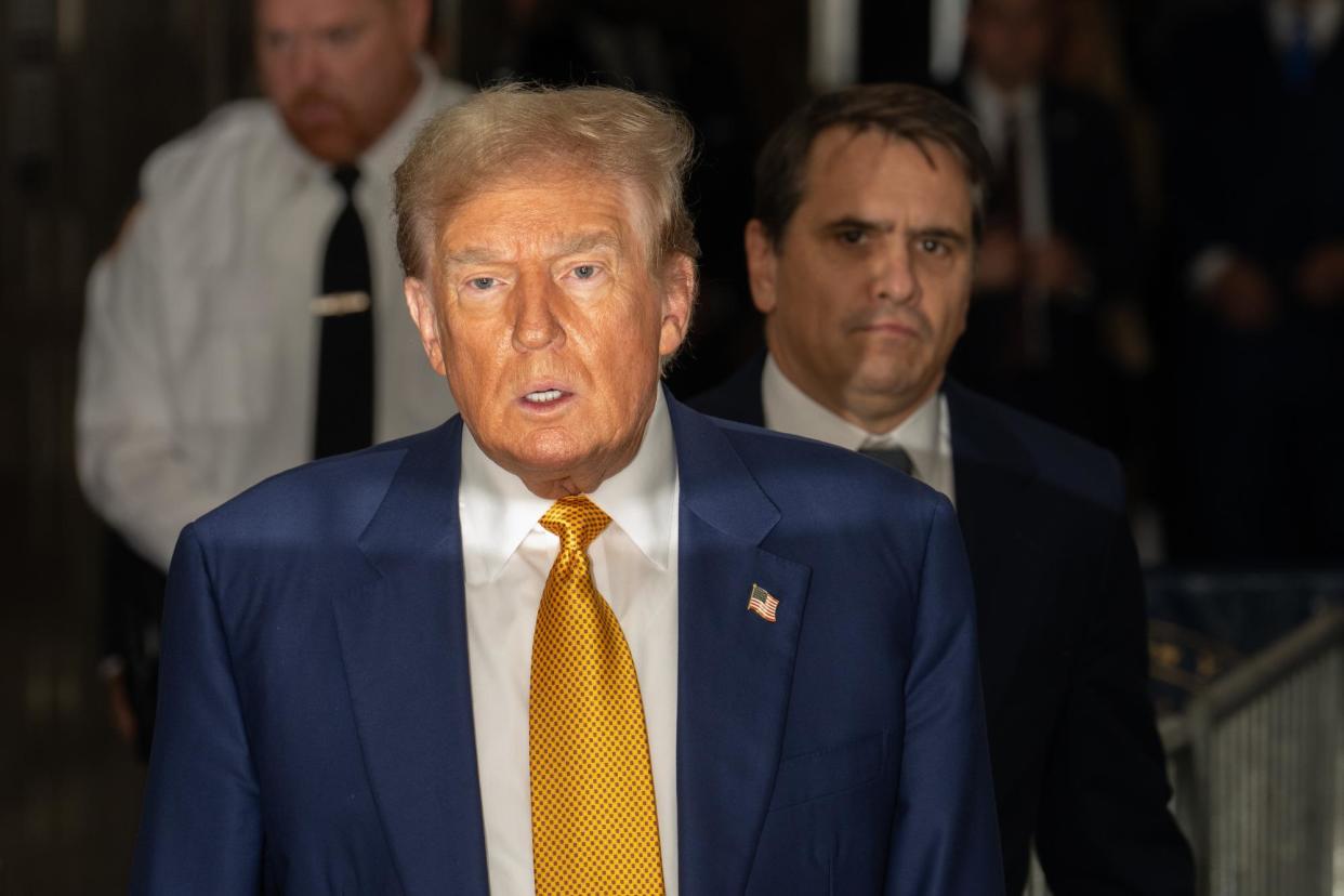 <span>Donald Trump outside court in New York on Thursday.</span><span>Photograph: Getty Images</span>