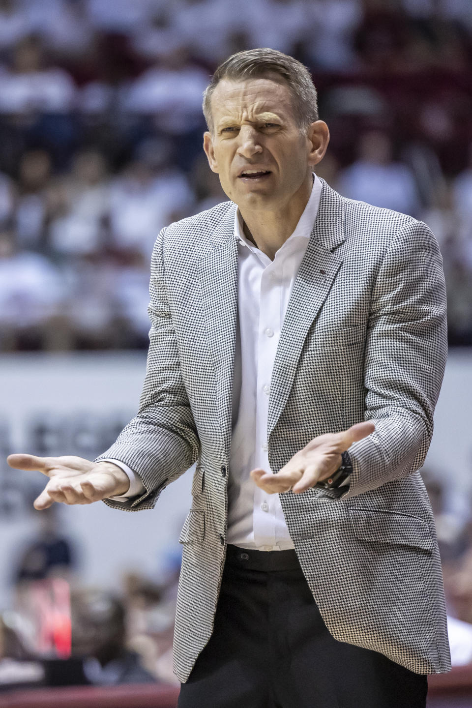 Alabama head coach Nate Oats reacts to call during the first half of an NCAA college basketball game against Arkansas, Saturday, Feb. 25, 2023, in Tuscaloosa, Ala. (AP Photo/Vasha Hunt)