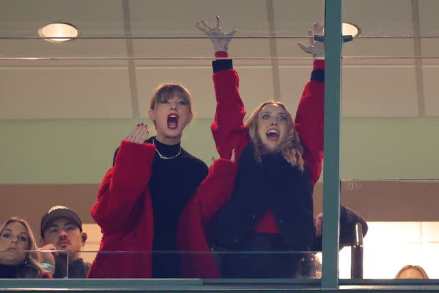 <p>Stacy Revere/Getty</p> Taylor Swift and Brittany Mahomes watch the Chiefs play the Green Bay Packers at Lambeau Field on Dec. 3, 2023