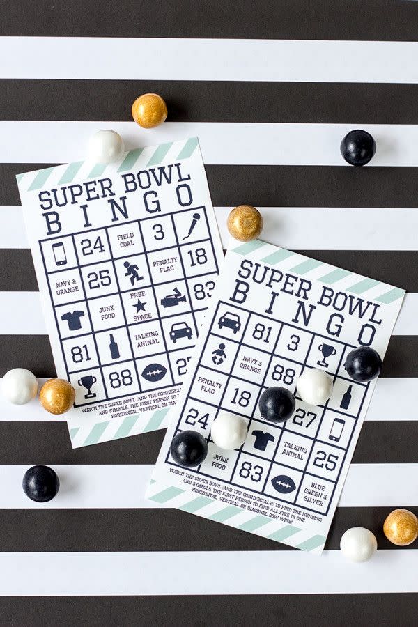 super bowl bingo cards with white gold and black bingo chips