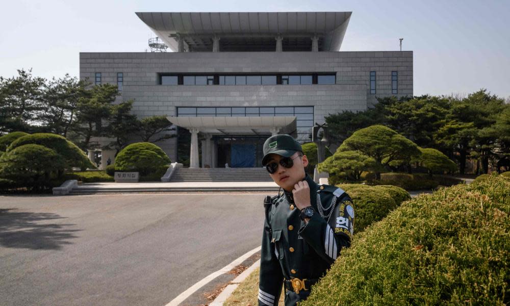 A soldier stands before ‘Peace Hall’, the venue of an upcoming summit between South Korean president Moon Jae-in and North Korean leader Kim Jong-un.