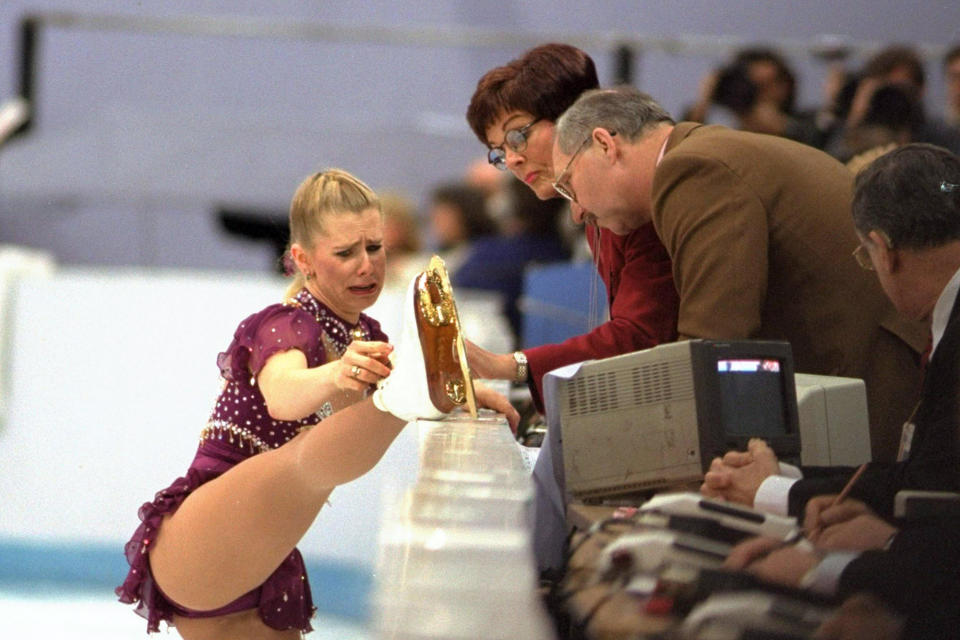 FILE - American figure skater Tonya Harding cries as she shows the judges a lace problem with her skate during her free skate program at the Winter Olympics on Feb. 25, 1994, in Hamar, Norway. Former award-winning Associated Press photographer John Gaps III, who documented everything from war zones to the NCAA College World Series during his career, was found dead at his home Monday, Oct. 17, 2022, in Des Moines, Iowa, his family confirmed Tuesday. He was 63. (AP Photo/John Gaps III)