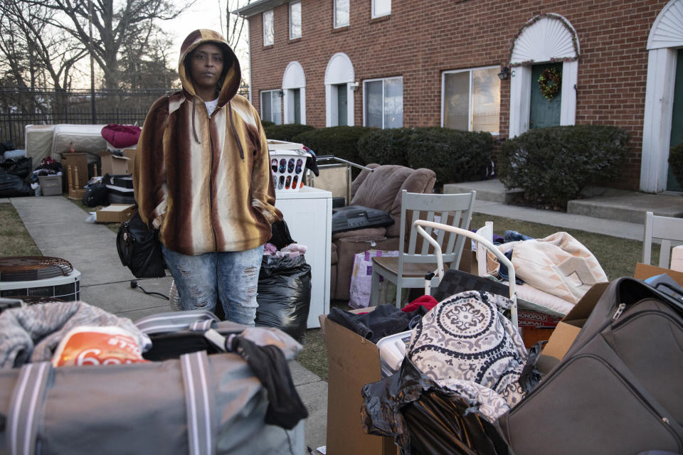 COLUMBUS, OH - MARCH 02:  Tiffany Padgett, 45, of Columbus, Ohio, poses watching items left by her neighbor, Shanta Thomas, who was evicted on March 2, 2021 in Columbus, Ohio. Padgett did not agree with the eviction, and wanted to help keep track of her neighbor's belongings. (Photo by Stephen Zenner/Getty Images)