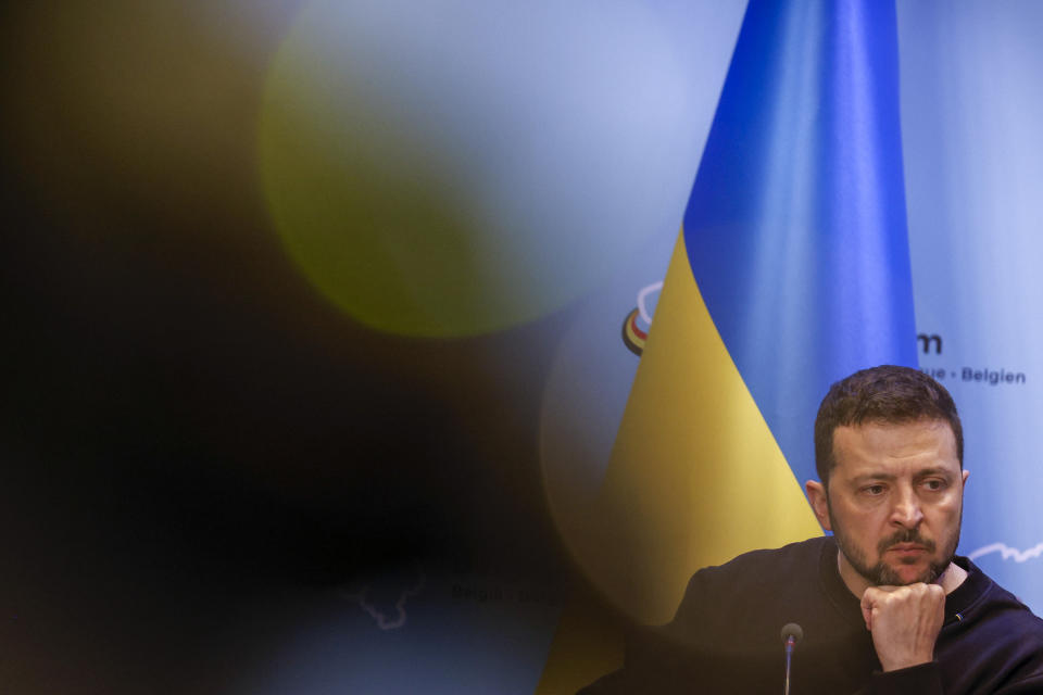 Ukraine's President Volodymyr Zelenskyy listens to a question as he talks to journalists during a joint news conference with Belgium's Prime Minister Alexander De Croo following their meeting at the prime ministers' office in Brussels, Tuesday, May 28, 2024. (AP Photo/Omar Havana)