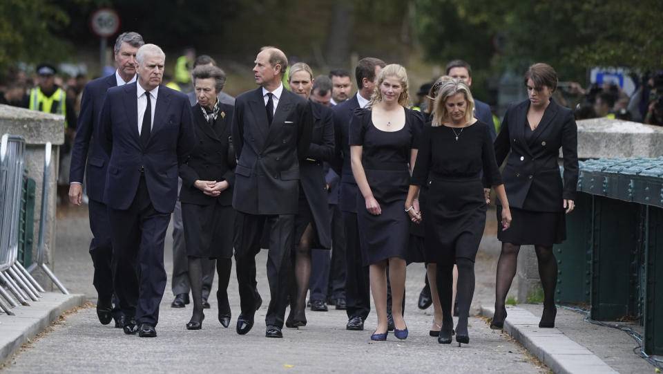 Foreground from left, Britain's Prince Andrew, Prince Edward, Lady Louise Windsor, Sophie, Countess of Wessex, Second row, Princess Anne, the Princess Royal, Vice Admiral Timothy Laurence, Zara Tindall, Peter Phillips and Princess Eugenie walk, to thank members of the public following the death of Queen Elizabeth II on Thursday, at Balmoral, Scotland, Saturday, Sept. 10, 2022. (Owen Humphreys/Pool Photo via AP)