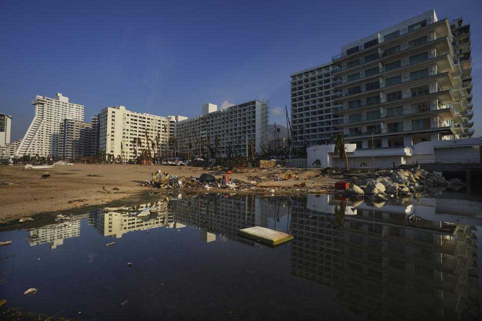 Debris lays on the beach nearly three weeks after Hurricane Otis hit as a Category 5 storm in Acapulco, Mexico, Friday, Nov. 10, 2023. (AP Photo/Marco Ugarte)