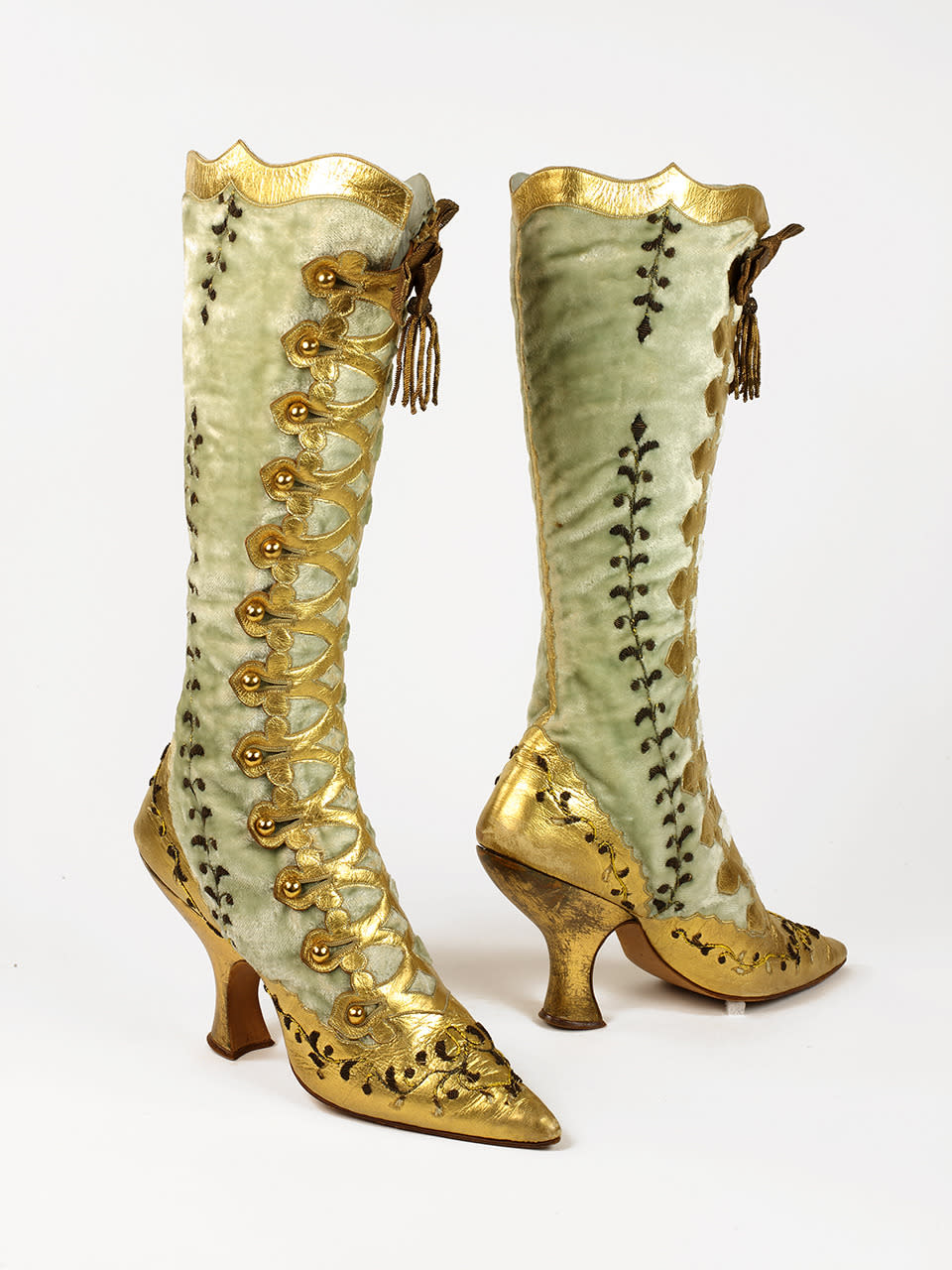 19th century gold button boots at the Bata Shoe Museum