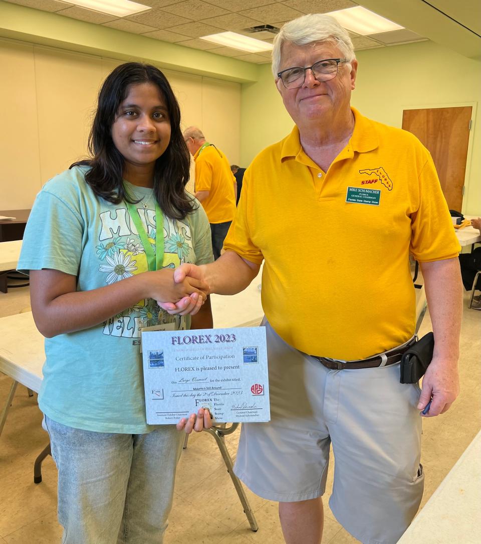 Sahitya Setty with her American Association of Philatelic Exhibitors Grand Youth Award.