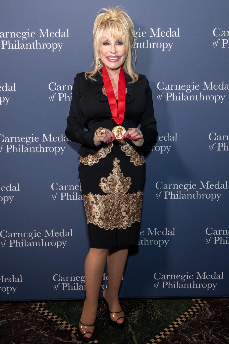 Dolly Parton Says Her Charity Work Isn't for 'a Tax Write-Off': 'Something I Can Take Pride In'. (credit: Carnegie Medal of Philanthropy)..