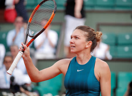 Tennis - French Open - Roland Garros, Paris, France - May 31, 2018 Romania's Simona Halep celebrates after winning her second round match against Taylor Townsend of the U.S. REUTERS/Charles Platiau