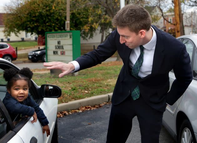 During his Senate run in 2016, Kander talked with Teh'Riyah Hinkel, 1, after thanking her aunt for coming out to vote during a last-minute campaign stop on Election Day. (Photo: Laurie Skrivan/St. Louis Post-Dispatch via Getty Images)