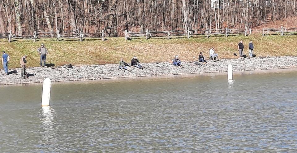 Angler try their luck April 1, the statewide opener of trout season in Pennsylvania, while fishing in Laurel Hill Lake in Laurel Hill State Park.