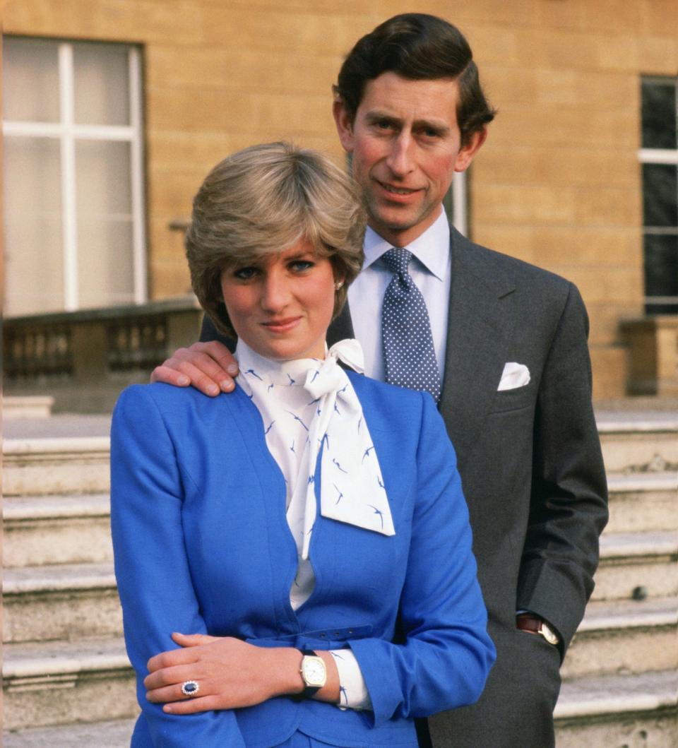 Diana reveals her sapphire and diamond engagement ring alongside Charles in the grounds of Buckingham Palace