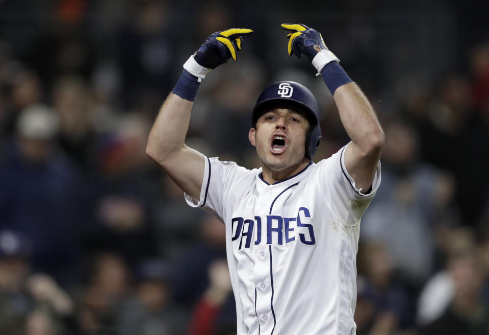 San Diego Padres' Ian Kinsler celebrates after hitting a three-run home run during the sixth inning of the team's baseball game against the Pittsburgh Pirates, Thursday, May 16, 2019, in San Diego. (AP Photo/Gregory Bull)