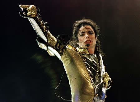 U.S. popstar Michael Jackson performs during his "HIStory World Tour" concert in Vienna, July 2, 1997. REUTERS/Leonhard Foeger/File Photo