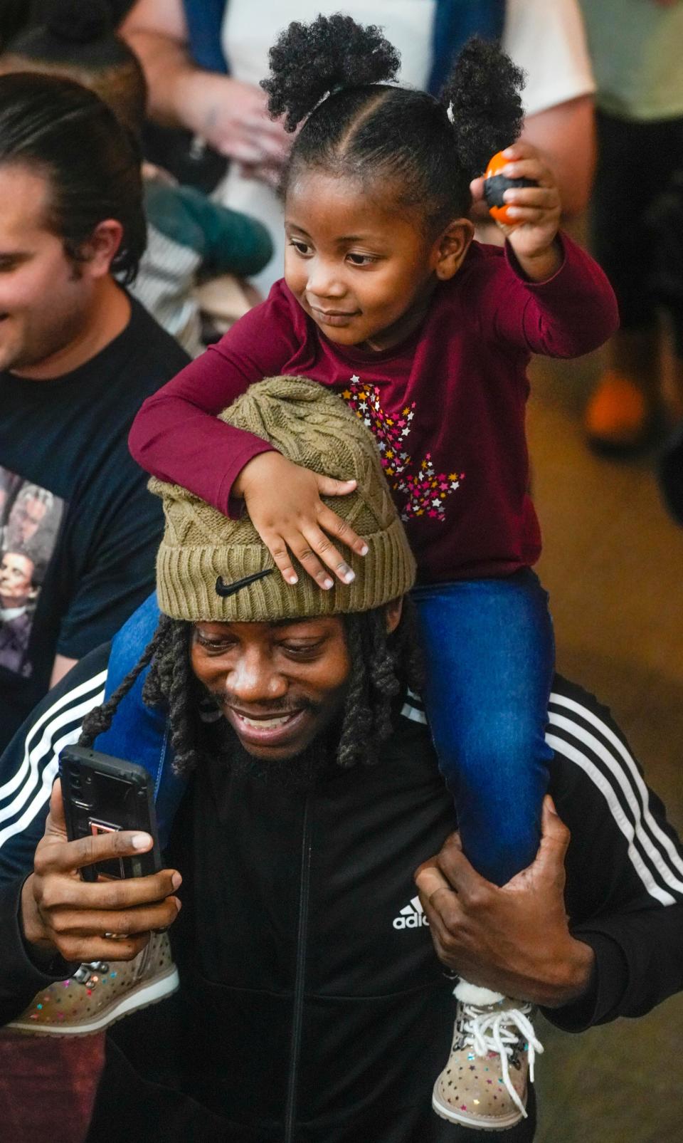 Families dance to the music prior to the ball dropping during the Milwaukee’s Betty Brinn Children’s Museum annual New Year’s Eve noon party Saturday, Dec. 31, 2022, in Milwaukee.