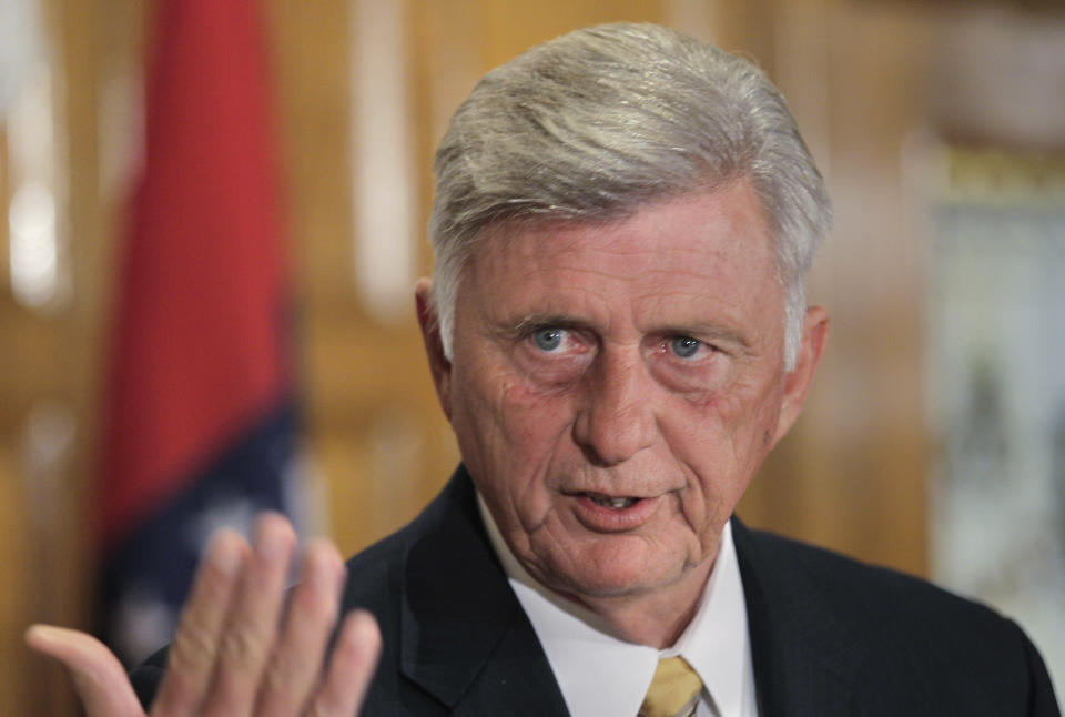 Arkansas Gov. Mike Beebe answers questions about the state's participation in the federal health care law at the Arkansas state Capitol in Little Rock, Ark., Monday, July 2, 2012. (AP Photo/Danny Johnston)