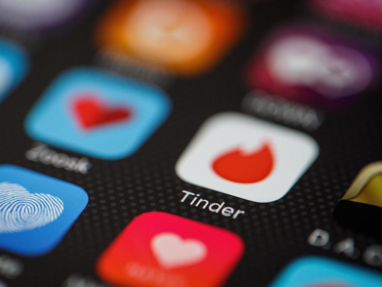 The "Tinder" app logo is seen amongst other dating apps on a mobile phone screen on November 24, 2016 in London, England: Getty Images