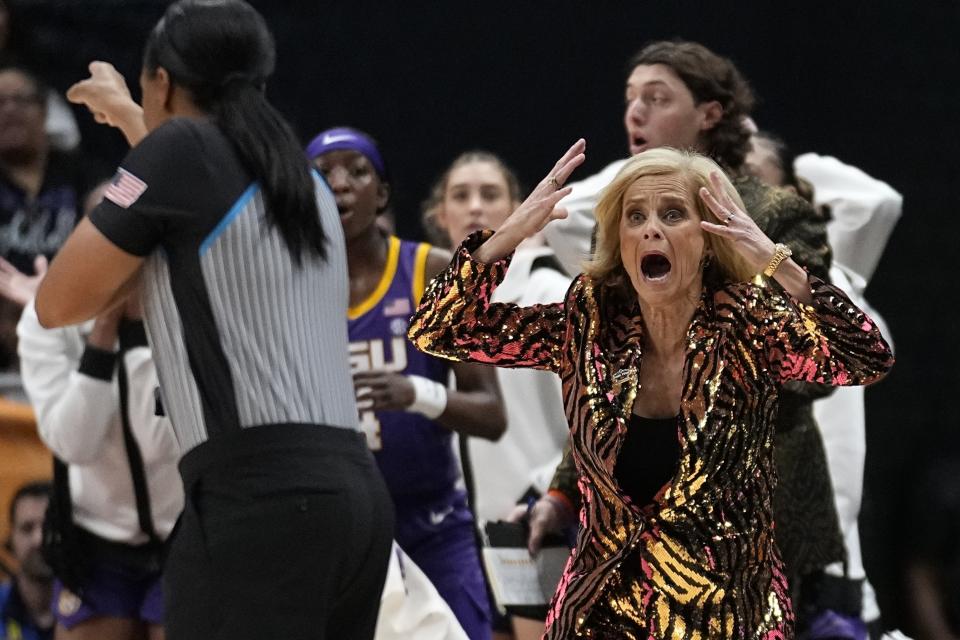 FILE - LSU head coach Kim Mulkey reacts to a call during the first half of the NCAA Women's Final Four championship basketball game against Iowa Sunday, April 2, 2023, in Dallas. (AP Photo/Tony Gutierrez, File)