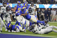 Los Angeles Rams running back Cam Akers dives into the end zone on a 6-yard touchdown run during the second half of an NFL football game against the Seattle Seahawks Sunday, Dec. 4, 2022, in Inglewood, Calif. (AP Photo/Mark J. Terrill)