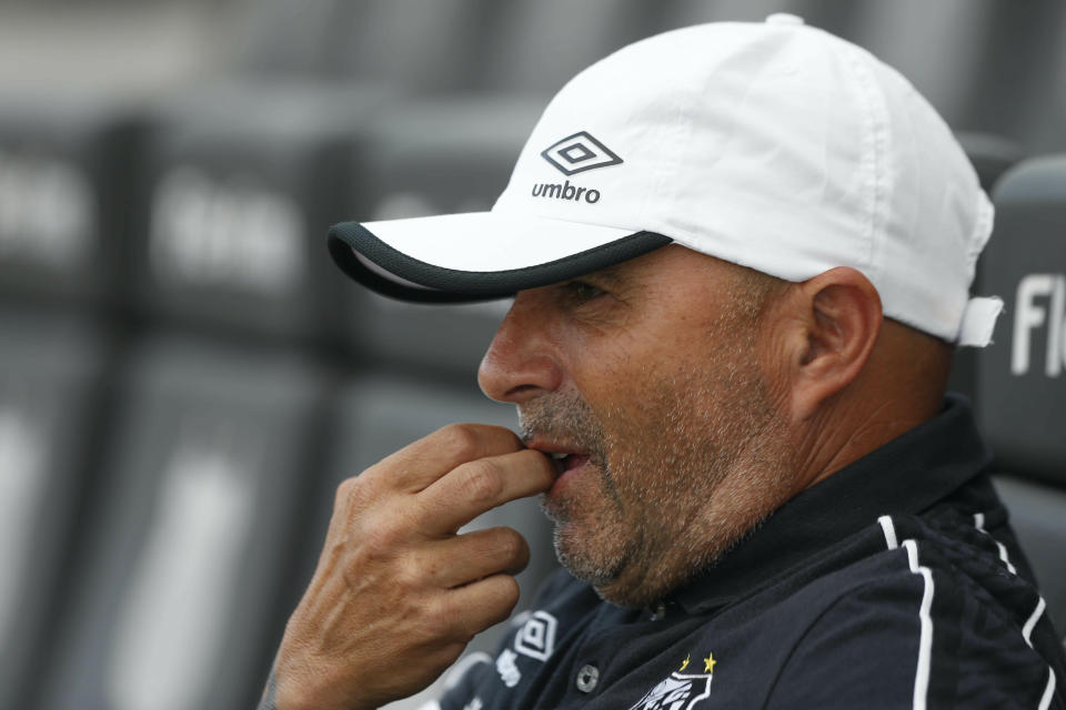 Jorge Sampaoli, coach of Santos, is seen prior to a Sao Paulo Soccer league championship match against Ferroviaria in Santos, Brazil, Saturday, Jan. 19, 2019. It's the first match of the coach Sampaoli, of Argentina, as head of the legendary Santos Soccer team. (AP Photo/Nelson Antoine)