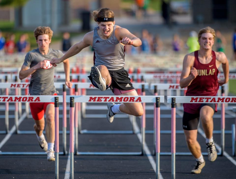 IVC's Nolin Hulett clears the last hurdle on his way to victory in the 110-meter hurdles during the Class 2A Metamora Sectional track and field meet Wednesday, May 18, 2022 at Metamora High School.