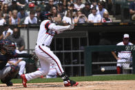 Chicago White Sox's Brian Goodwin (18) breaks his bat during the second inning of a baseball game against the Cleveland Indians, Sunday, Aug. 1, 2021, in Chicago. (AP Photo/Matt Marton)