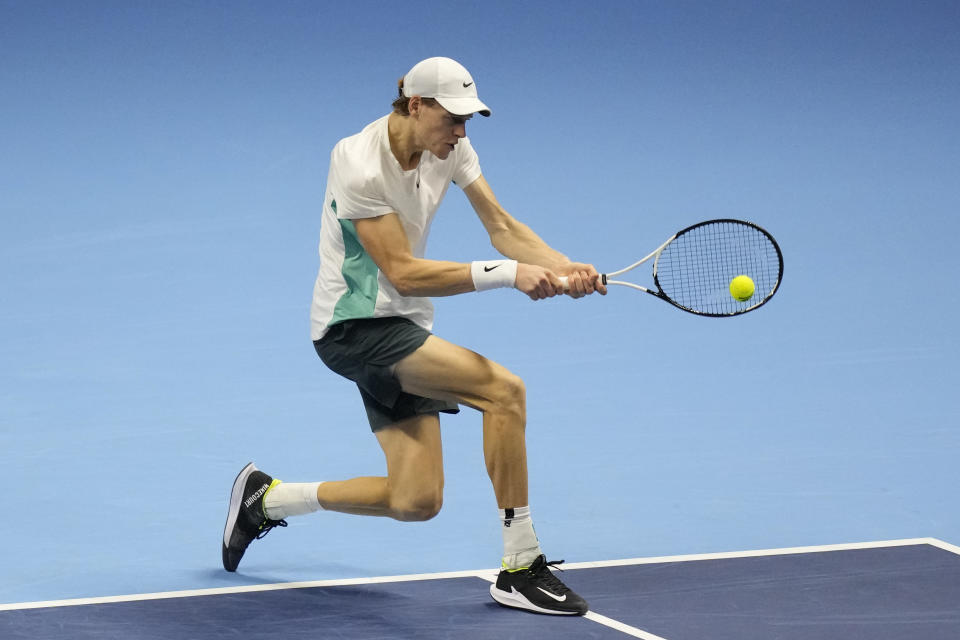 Italy's Jannik Sinner reacts during the singles tennis match against Serbia's Novak Djokovic, of the ATP World Tour Finals at the Pala Alpitour, in Turin, Italy, Tuesday, Nov. 14, 2023. (AP Photo/Antonio Calanni)