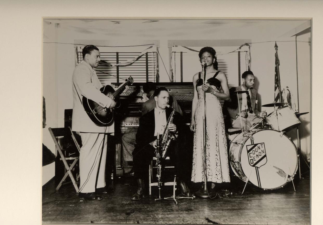 Musical entertainment played a large part in photographer Taylor Matthews' depiction of life in Canton's Black community. Here, he pictures Esther Williams singing with the Count Demon band.