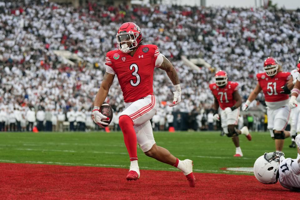 Jan 2, 2023; Pasadena, California, USA; Utah Utes running back Ja'Quinden Jackson (3) scores a touchdown against the Penn State Nittany Lions in the second quarter of the 109th Rose Bowl game at the Rose Bowl. Mandatory Credit: Kirby Lee-USA TODAY Sports