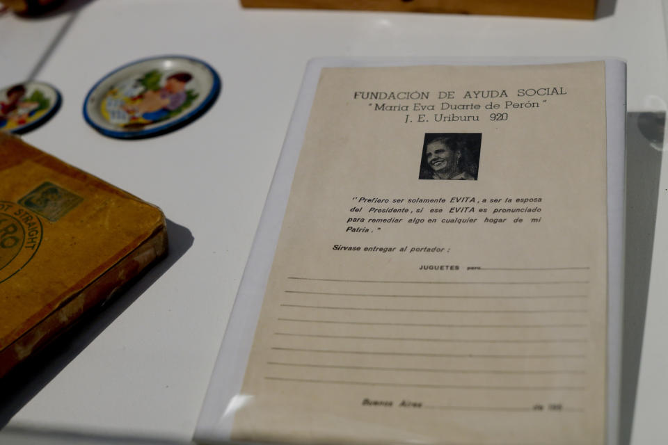 Papers used to register the distribution of toys by the Eva Perón Foundation are displayed at an exhibit at the Evita Museum in Buenos Aires, Argentina Wednesday, April 17, 2019. The practice of distributing toys to poor children was fundamental to the rise in popularity of the Peróns, and the at times unconditional backing Peronism had from its supporters, which would persist far beyond the deaths of its two leaders, Juan Domingo Perón and his wife Eva María Duarte, famously known as Evita. (AP Photo/Natacha Pisarenko)