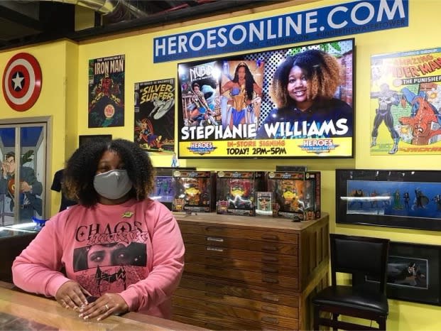 Stephanie Williams photo at HeroesCon booth