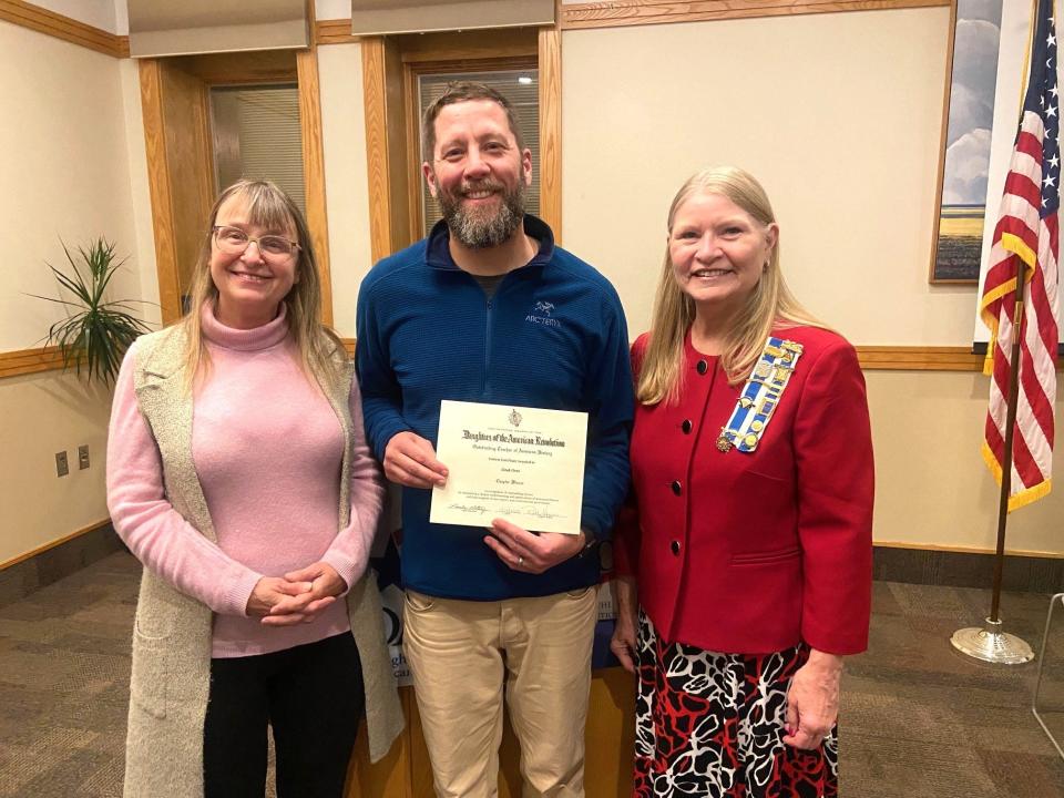 Outstanding Teacher of American History Award recipient Derek Orme (center) with Debbie Albert (left) and Ruth Harris.