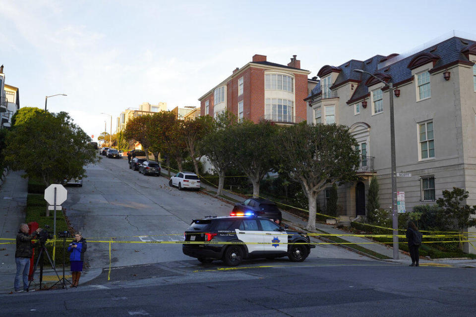 Police tape blocks a street outside the home of Paul Pelosi, the husband of House Speaker Nancy Pelosi, in San Francisco, Oct. 28, 2022.  / Credit: Eric Risberg / AP