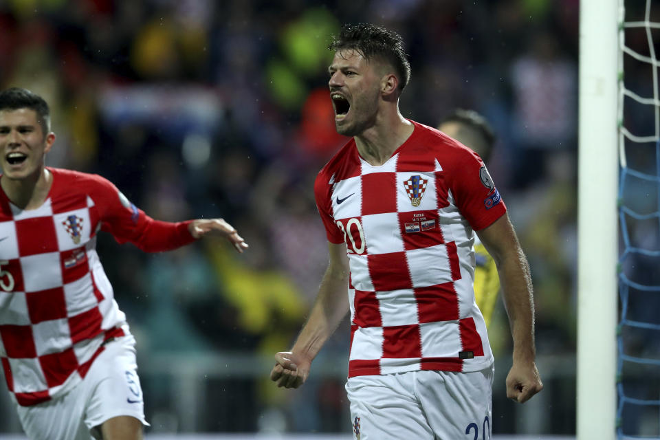 Croatia's Bruno Petkovic celebrates after scoring his side's second goal during the Euro 2020 group E qualifying soccer match between Croatia and Slovakia at the Rujevica stadium in Rijeka, Croatia, Saturday, Nov. 16, 2019. (AP Photo/Daniel Kasap)