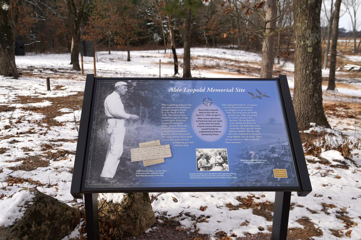 A sign marks the field where Aldo Leopold died in 1948 while fighting a grass fire on what was then his neighbor's farm. The land is now owned by the Aldo Leopold Foundation, Inc. and is part of the Leopold-Pines Conservation Area.