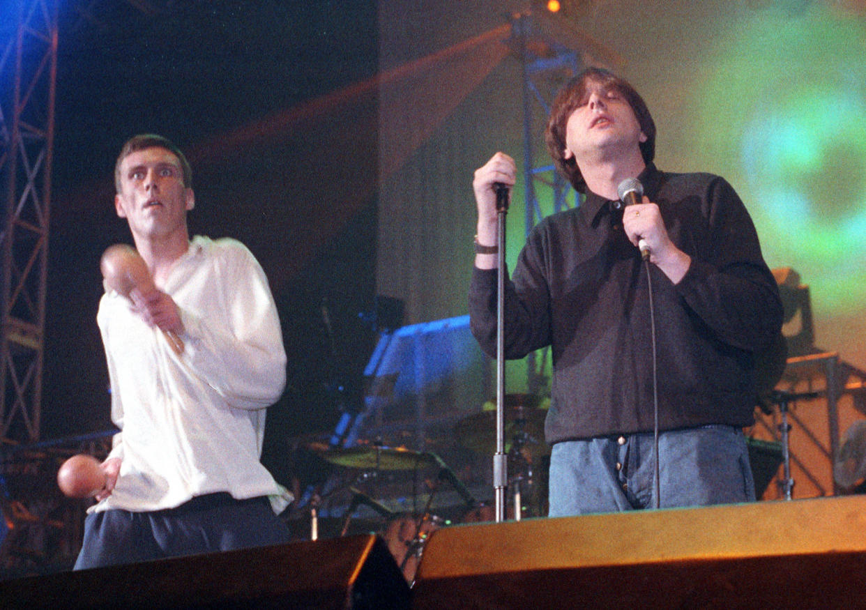 Bez and Shaun Ryder of the Happy Mondays performing on stage at Astoria Theatre, London, 14 March 1989. (Photo by Ian Dickson/Redferns)