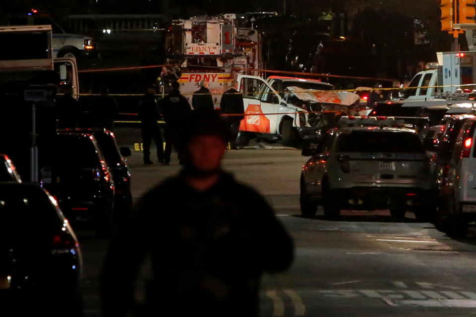 A pickup truck used in an attack sits on the intersection of West and Chambers Street.