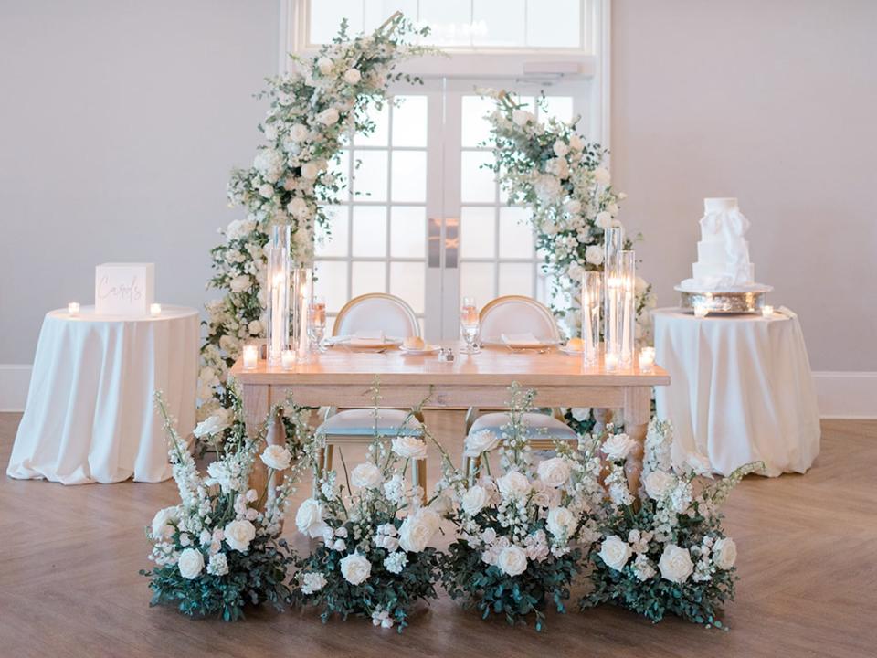 A sweetheart table at a wedding.