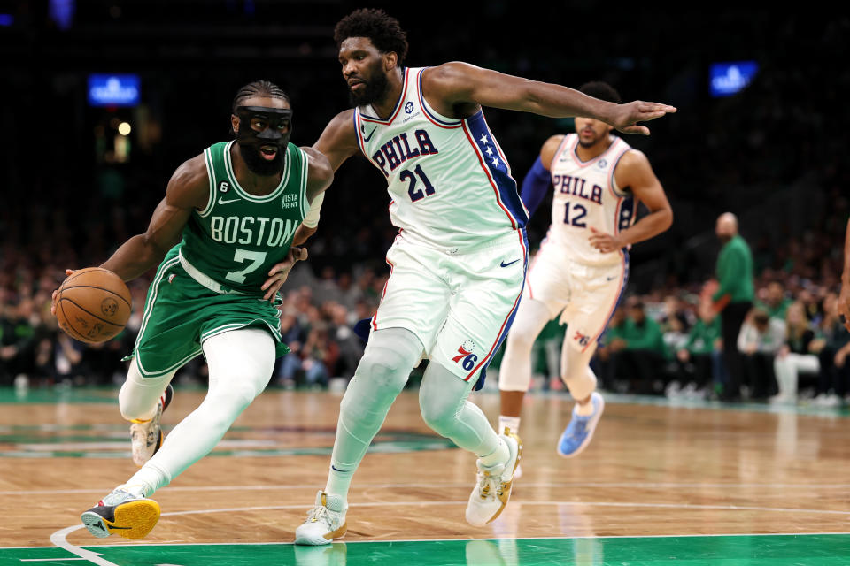 Philadelphia 76ers center Joel Embiid defends Boston Celtics wing Jaylen Brown during the second half of Game 2 of the Eastern Conference semifinals at TD Garden on Wednesday. (Maddie Meyer/Getty Images)