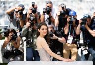 <p>Marion Cotillard is caught in a sea of photographers at the <em>Brother And Sister (Frere Et Soeur) </em>photocall during the Cannes Film Festival in France on May 21.</p>