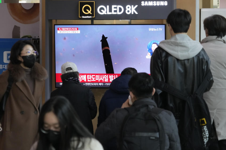 A TV screen shows a file image of North Korea's missile launch during a news program at the Seoul Railway Station in Seoul, South Korea, Monday, Feb. 20, 2023. North Korea has fired a pair of short-range ballistic missiles off its east coast on Monday, South Korea's military said, two days after the North resumed testing activities with an intercontinental ballistic missile launch. (AP Photo/Ahn Young-joon)