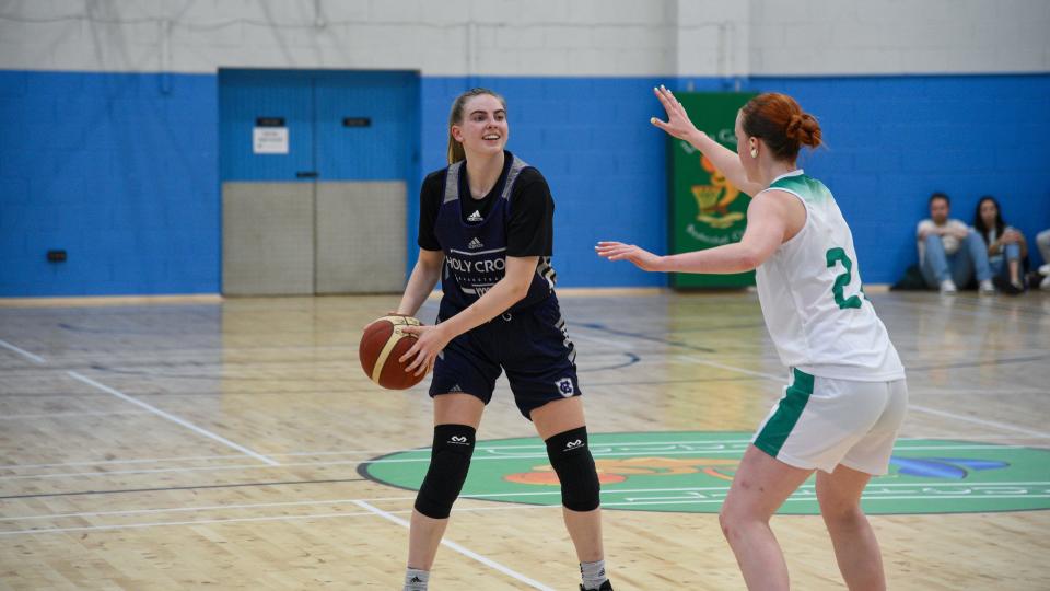 Holy Cross forward Bronagh Power-Cassidy looks for a passing lane in an exhibition game during the Crusaders recent trip to Dublin.