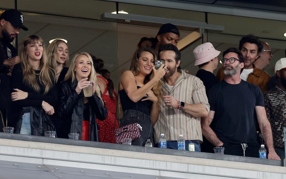 Singer Taylor Swift, Brittany Mahomes, actress Blake Lively and actors Ryan Reynolds and Hugh Jackman attend a game between the New York Jets and the Kansas City Chiefs at MetLife Stadium on October 01, 2023 in East Rutherford, New Jersey.